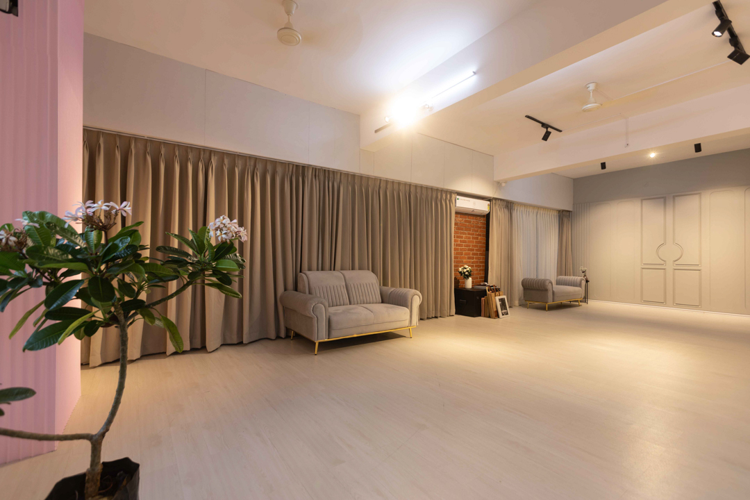 Warm ambient studio scene with curtains and seating